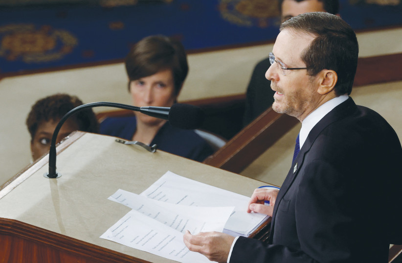  PRESIDENT ISAAC HERZOG addresses a joint session of the US Congress on Wednesday. ‘The world cannot remain indifferent to the Iranian regime’s call to wipe Israel off the map,’ he declared. (photo credit: JONATHAN ERNST/REUTERS)