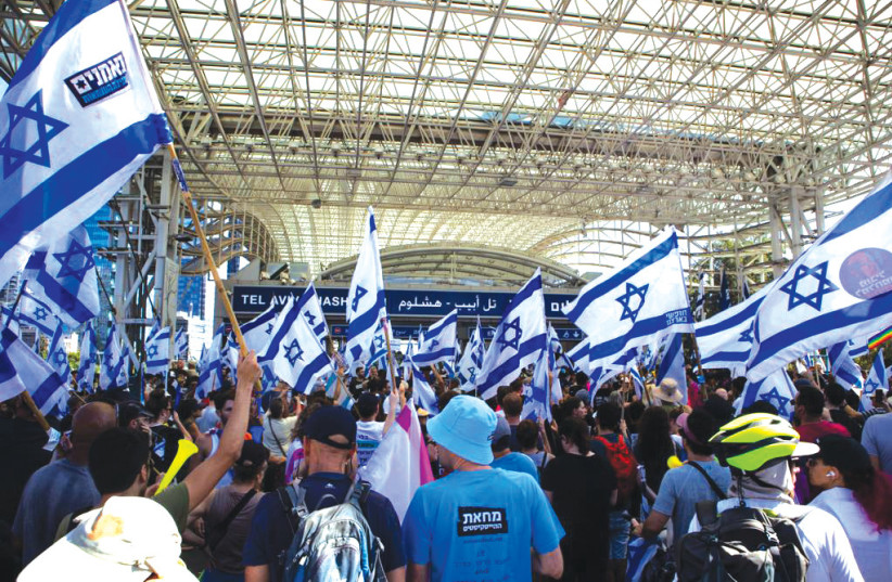  PROTESTERS CONVERGE on Tel Aviv’s Hashalom train station on Tuesday during the Day of Disruption against the judicial reform legislation (photo credit: I.H. Mintz)