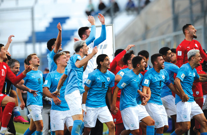  THE ISRAELI soccer team celebrates reaching the quarter-finals in the FIFA U20 World Cup in Argentina in June (photo credit: AGUSTIN MARCARIAN/REUTERS)