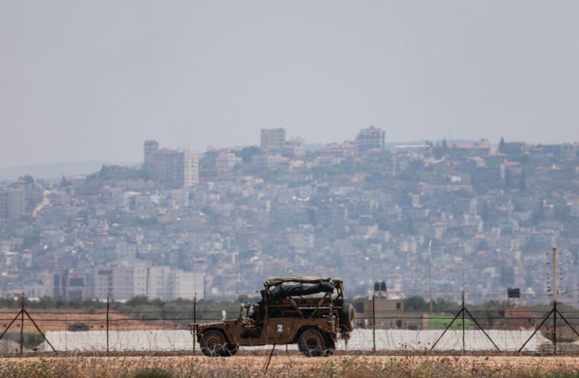  AN IDF jeep on the outskirts of Jenin earlier this month, at the beginning of one of its biggest military operations in the Palestinian territory in years. (photo credit: Chaim Goldberg/Flash90)