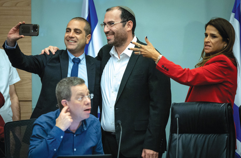  MK SIMCHA ROTHMAN, head of the Constitution, Law, and Justice Committee, takes a selfie with MK Ofir Katz after a committee meeting on the reasonableness bill this week (photo credit: YONATAN SINDEL/FLASH90)