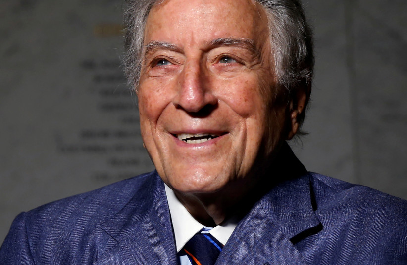  Singer and artist Tony Bennett poses for a portrait before an opening of his art exhibition in the Manhattan borough of New York, US, May 3, 2017. (photo credit: REUTERS/CARLO ALLEGRI/FILE PHOTO)