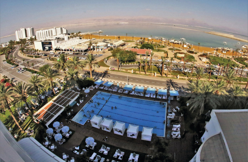  THE VIEW of the Noga hotel pool and the Dead Sea from each room is not a sight you will forget in a hurry. The colors of the landscape constantly change. (photo credit: ORI LEWIS)