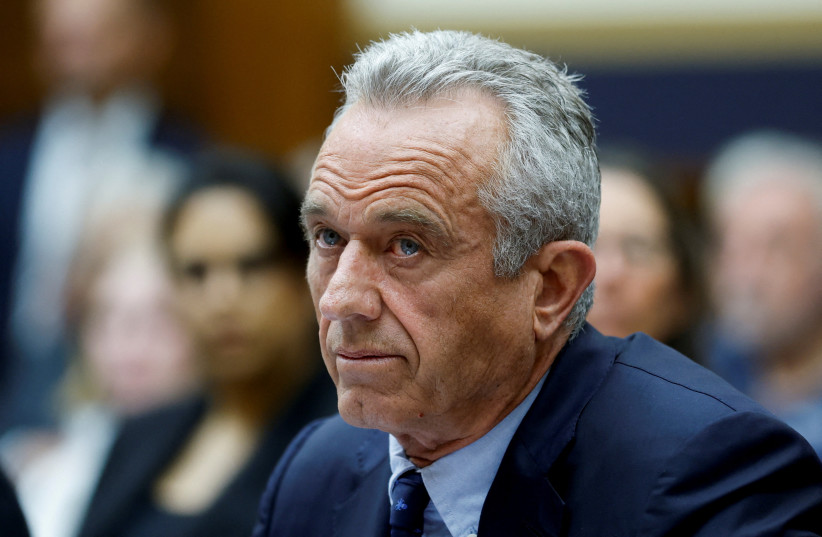 Democratic presidential candidate Robert F. Kennedy Jr. looks on at a House Judiciary Select Weaponization of the Federal Government Subcommittee hearing, examining the Missouri v. Biden case, on Capitol Hill in Washington, DC, US, July 20, 2023. (photo credit: REUTERS/JONATHAN ERNST)