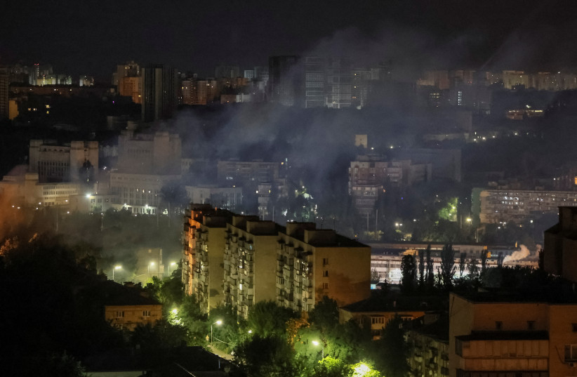  Smoke rises in the sky over the city after a Russian drone strike, amid Russia's attack on Ukraine, in Kyiv, Ukraine July 13, 2023. (photo credit: GLEB GARANICH/REUTERS)