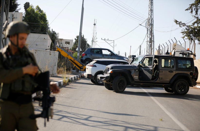  A general view of the car in which, according to an Israeli military statement and Army Radio, three Palestinians who fired at Israeli forces were killed by Israeli troops, in Nablus, in the West Bank July 25, 2023. (photo credit: REUTERS/RANEEN SAWAFTA)