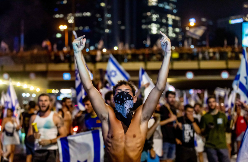  Israelis are seen protesting against judicial reform after the passage of the Law to Cancel the Reasonableness Standard, on July 24, 2023. (photo credit: ODED ANGEL)