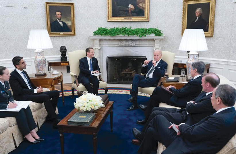  Israeli President Isaac Herzog is seen meeting with US President Joe Biden in the White House. (photo credit: HAIM ZACH/GPO)