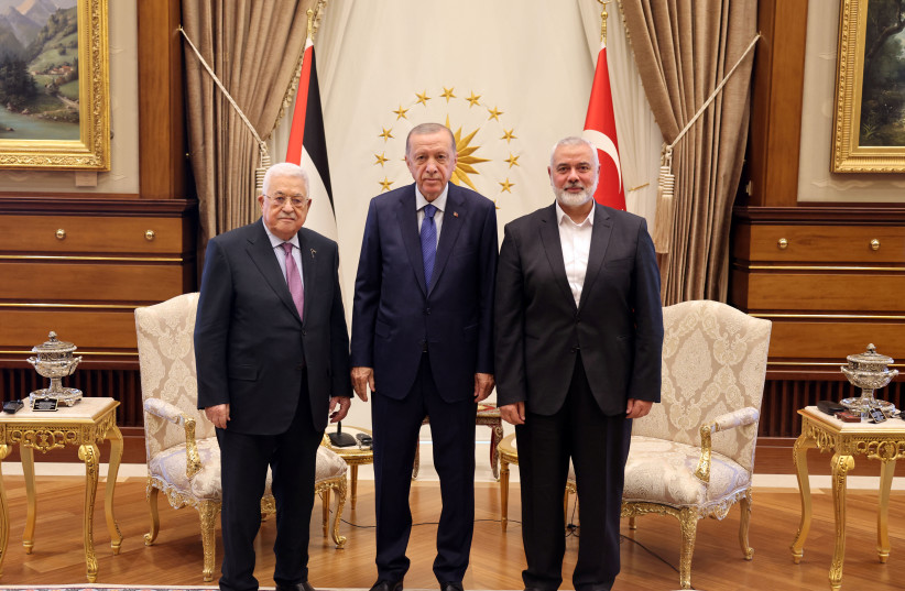  Turkey's President Tayyip Erdogan meets with Palestinian President Mahmoud Abbas and Palestinian group Hamas' top leader Ismail Haniyeh at the Presidential Palace in Ankara, Turkey, July 26, 2023. (photo credit: PALESTINIAN PRESIDENT OFFICE VIA REUTERS)
