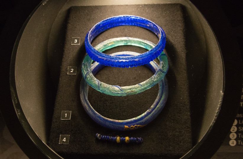  Glass bracelets from female graves in Bohemia. La Tène culture, 3rd century BC. The Celts, exhibition in the National Museum in Prague. (photo credit: Wikimedia Commons)