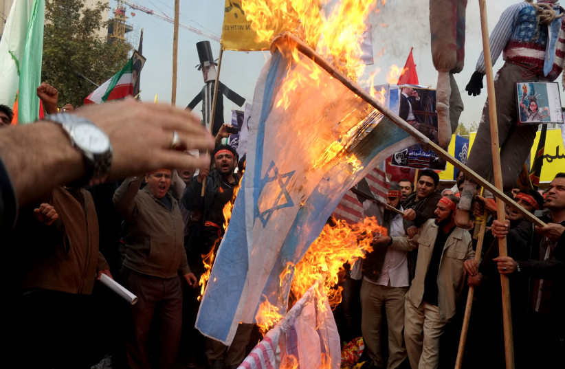  IRAN WANTS to spoil Israel's diplomatic opportunities: In Tehran.  (photo credit: Majid Saeedi/Getty Images)