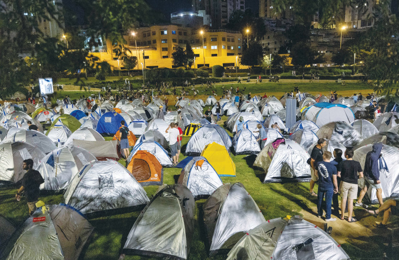  THE TENT CITY set up in Jerusalem’s Sacher Park this week by opponents to the government’s judicial overhaul plans.  (photo credit: YONATAN SINDEL/FLASH90)
