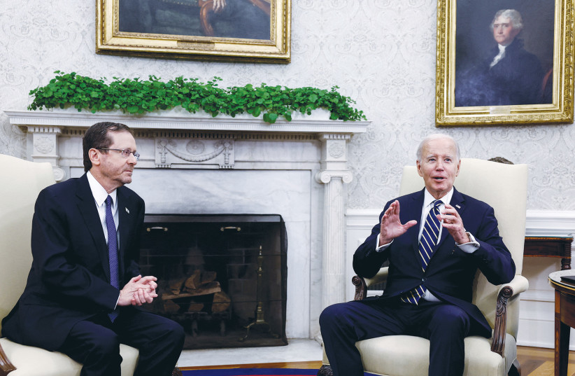  US PRESIDENT Joe Biden speaks during his meeting with President Isaac Herzog in the Oval Office of the White House.  (photo credit: EVELYN HOCKSTEIN/REUTERS)