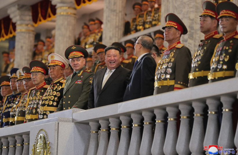  North Korean leader Kim Jong Un, Chinese Communist Party politburo member Li Hongzhong and Russia's Defense Minister Sergei Shoigu attend a military parade to commemorate the 70th anniversary of the Korean War armistice in Pyongyang, North Korea, July 27, 2023. (photo credit: KCNA VIA REUTERS)