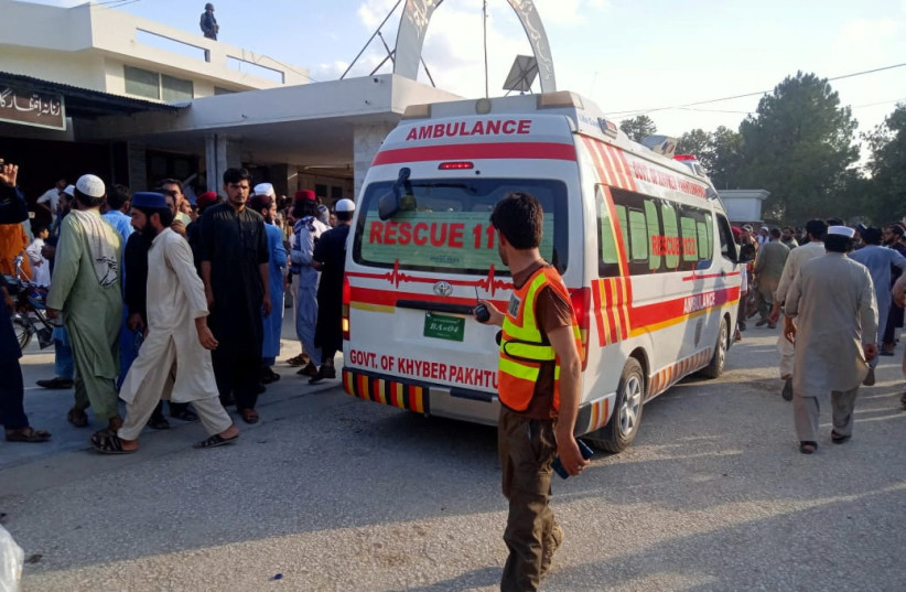  An ambulance carries the injured to the hospital, after a blast in Bajaur district of Khyber Pakhtunkhwa province, Pakistan July 30, 2023. (photo credit: Rescue 1122/Handout via REUTERS)