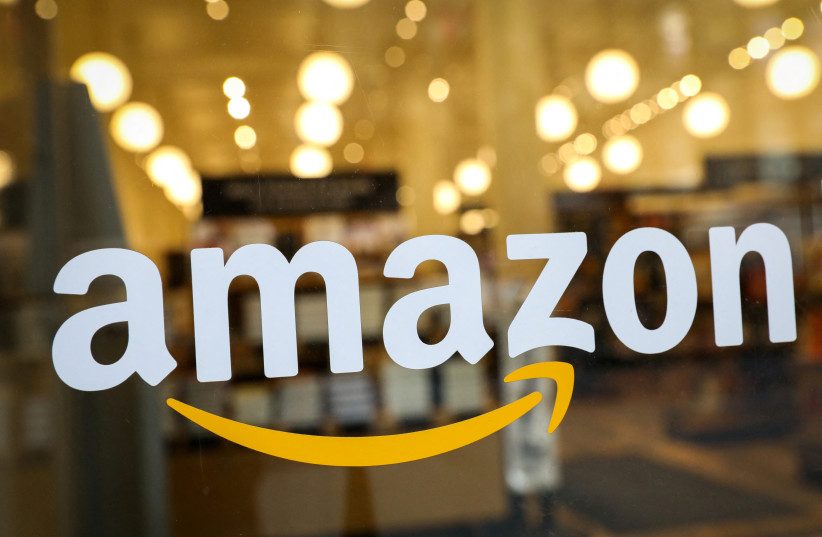  Amazon's logo as seen on a window (photo credit: REUTERS)