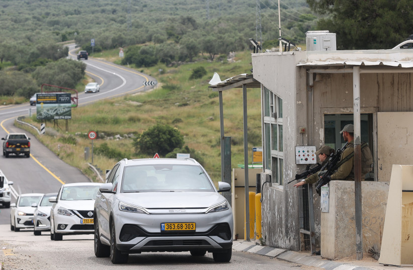  Israeli soldiers guard at a checkpoint not far from the scene of a shooting attack, in the Northern West Bank, July 6, 2023 (photo credit: NASSER ISHTAYEH/FLASH90)