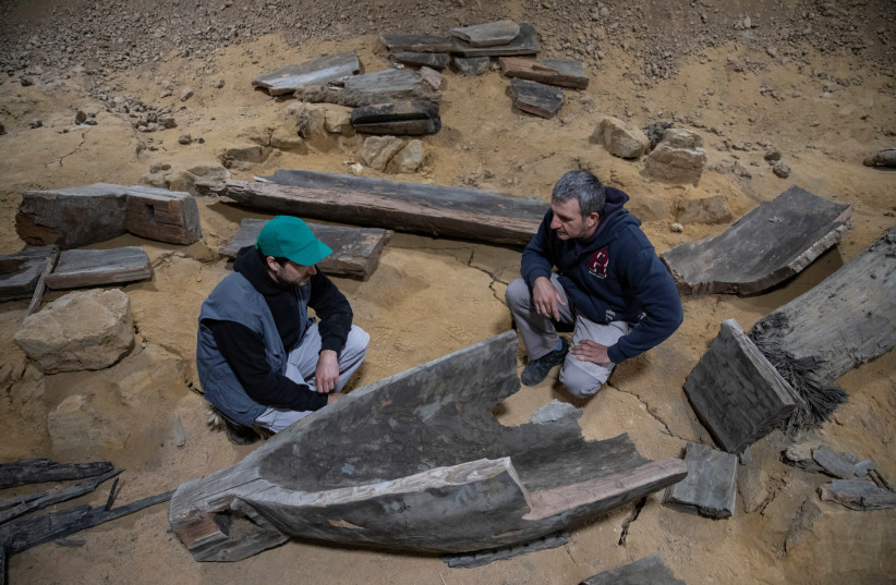  Archaeologists look at parts of a wooden Roman ship dated to the 3rd century AD, at the ancient city of Viminacium, near Kostolac, Serbia, May 28, 2020.  (photo credit: MARKO DJURICA/REUTERS)