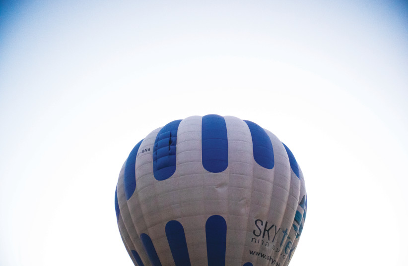  THE SKY Trek balloon in the sky, awaiting departure.  (photo credit: I.H. Mintz)