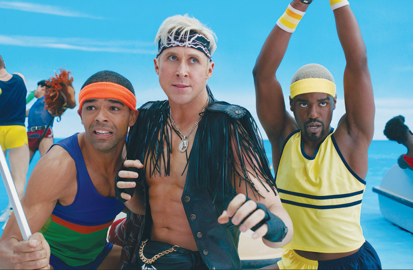  KINGSLEY BEN-ADIR (from left), Ryan Gosling, and Ncuti Gatwa prepare for the ‘beach-off’ in ‘Barbie.’  (photo credit: Warner Bros. Pictures/TNS)