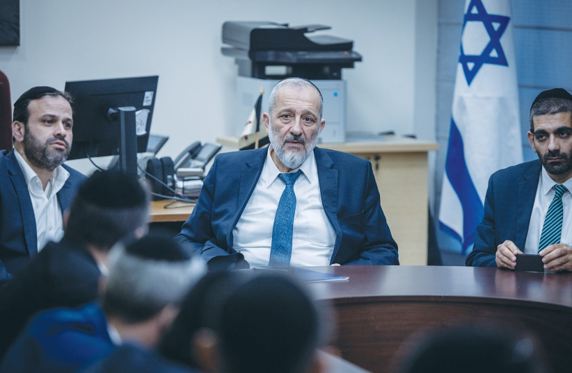  MK ARYE DERI leads a parliamentary faction meeting of his Shas party, in the Knesset, last month. (photo credit: Chaim Goldberg/Flash90)
