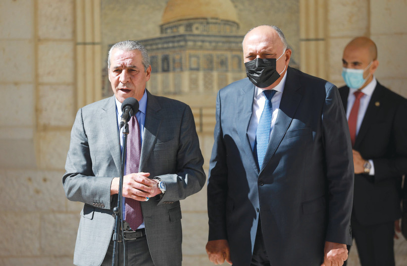  HUSSEIN AL-SHEIKH, a Palestinian Authority cabinet minister, speaks alongside visiting Egyptian Foreign Minister Sameh Shoukry in Ramallah, in 2021. (photo credit: FLASH90)