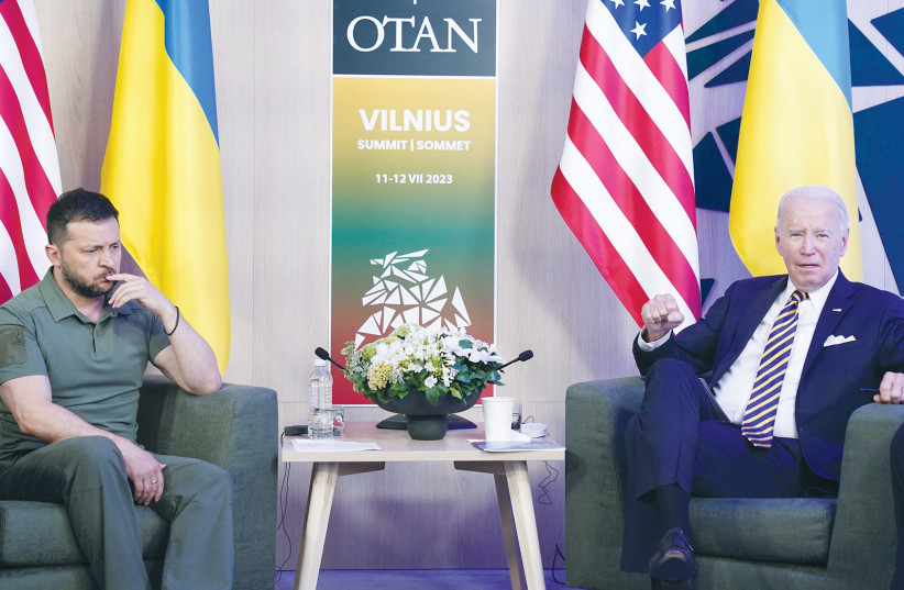  UKRAINE’S PRESIDENT Volodymyr Zelensky and US President Joe Biden hold a bilateral meeting, as the NATO summit takes place in Vilnius, last month. (photo credit: KEVIN LAMARQUE/REUTERS)