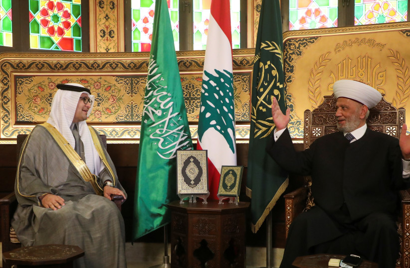  Saudi Ambassador to Lebanon Walid bin Abdullah Bukhari meets with the Grand Mufti Sheikh Abdul Latif Derian, in Beirut, Lebanon April 11, 2022 (photo credit: MOHAMED AZAKIR/REUTERS)