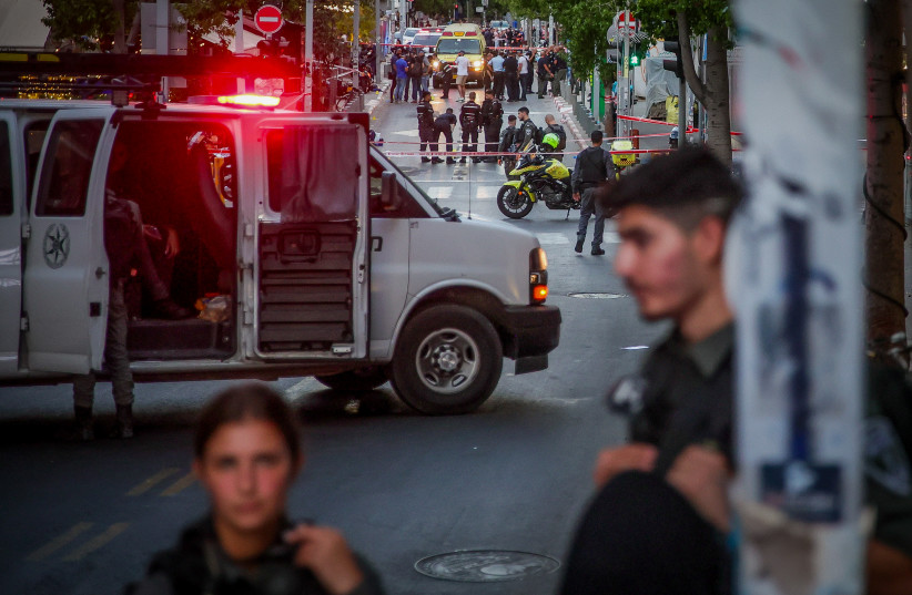  Police and rescue forces at the scene of a terror attack in Tel Aviv on August 5, 2023.  (photo credit: ITAI RON/FLASH90)