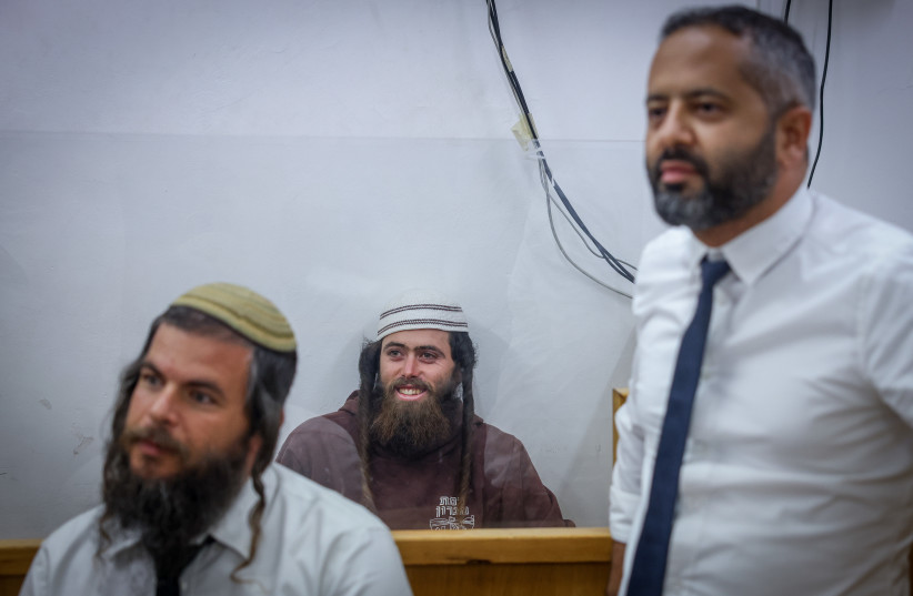  Elisha Yered, an Israeli settler suspected of being involved in the death of a Palestinian teenager, is seen at the Jerusalem Magistrate's Court, on August 5, 2023. (photo credit: CHAIM GOLDBEG/FLASH90)