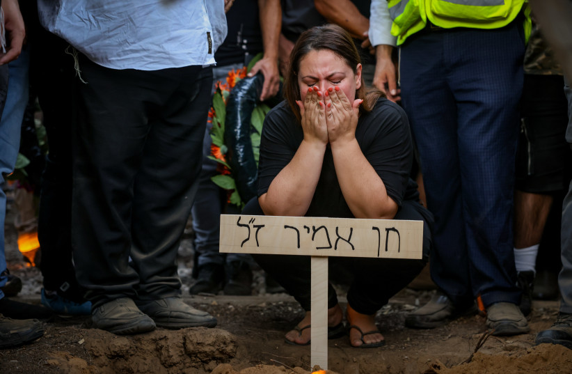  Hundreds attend the funeral of Chen Amir, a municipal security patrolman who was killed in a terror attack yesterday in Tel Aviv, at the cemetery in Kibbutz Reim, August 6, 2023 (photo credit: CHAIM GOLDBEG/FLASH90)