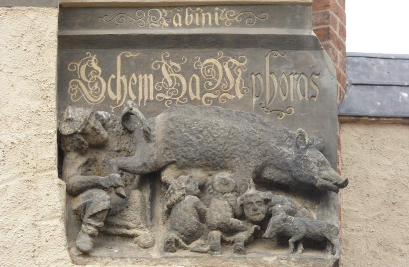  The Judensau carving. (photo credit: Wikimedia Commons)
