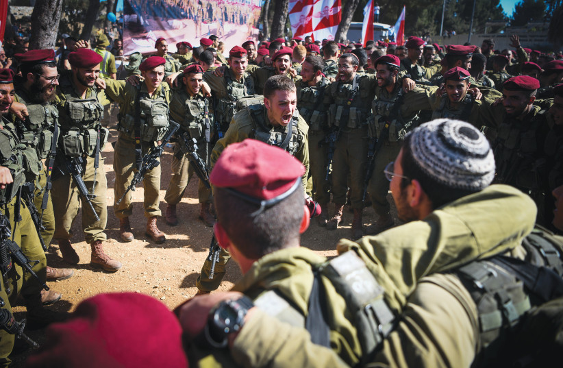  PARATROOPERS BRIGADE SOLDIERS attend a swearing-in ceremony at Ammunition Hill in Jerusalem. (photo credit: Arie Leib Abrams/Flash90)