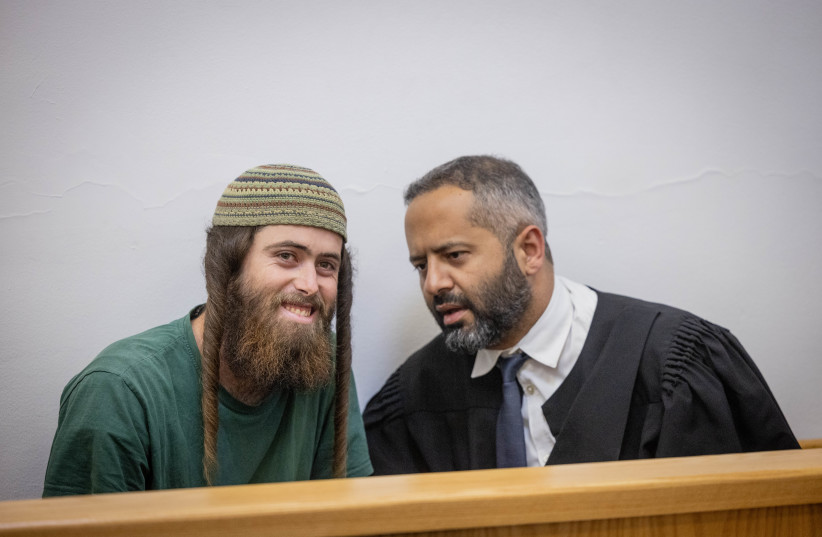  Elisha Yered, suspected of being involved in the death of 19-year-old Palestinian Qusai Jamal Maatan in the West Bank village of Burqa, arrives for a hearing at the District Court in Jerusalem, August 8, 2023 (photo credit: Chaim Goldberg/Flash90)