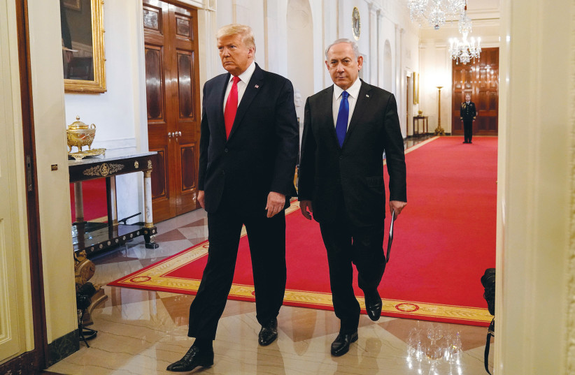  PRIME MINISTER Benjamin Netanyahu and then-US president Donald Trump at the White House, in 2020. Are the current two crises uniquely American and Israeli?  (photo credit: JOSHUA ROBERTS/REUTERS)