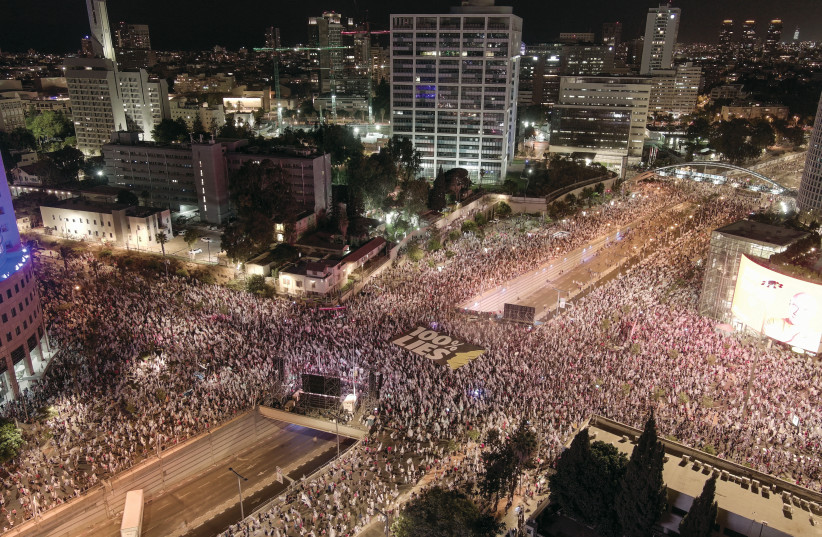  An aerial view shows protesters attending a demonstration against Israeli Prime Minister Benjamin Netanyahu and his nationalist coalition government’s judicial overhaul, in Tel Aviv, August 5.  (photo credit: ILAN ROSENBERG/REUTERS)