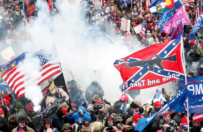  CONFLICT DURING the January 6, 2021, riots at US Capitol Building in Washington, DC, included white Christian supremacists.  (photo credit: Shannon Stapleton/Reuters)