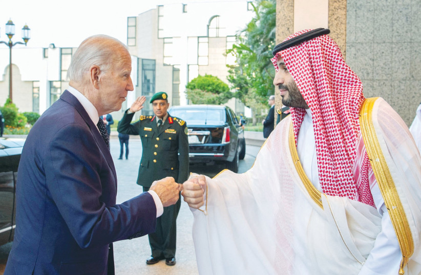  SAUDI CROWN Prince Mohammed bin Salman and US President Joe Biden fist bump upon the latter’s arrival at Al Salman Palace, in Jeddah, last year.  (photo credit: Saudi Royal Court/Reuters)