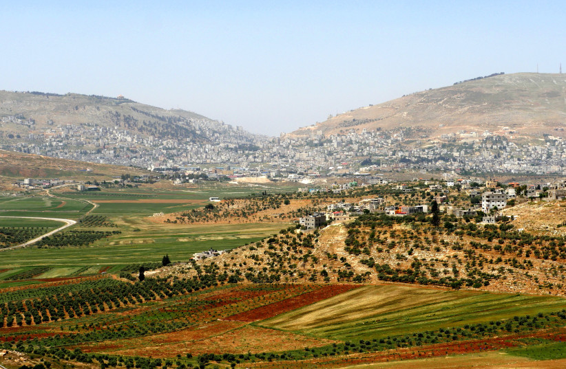  Mount Ebal (left) and Mount Gerizim.  (photo credit: Wikimedia Commons)