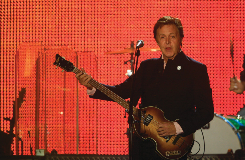  ‘WHEN I’M 64’ singer-songwriter and former Beatle Sir Paul McCartney, now 81, performs in Tel Aviv in 2008. (photo credit: NATI SHOHAT/FLASH90)