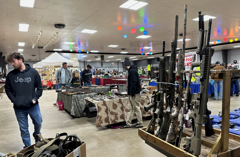  AR-10s for sale at the Belle-Clair Fairgrounds & Expo Center Gun Show, after the state of Illinois passed its "assault weapons" ban into law, in Belleville, Illinois, U.S., January 14, 2023. (photo credit: REUTERS/KATE MUNSCH)
