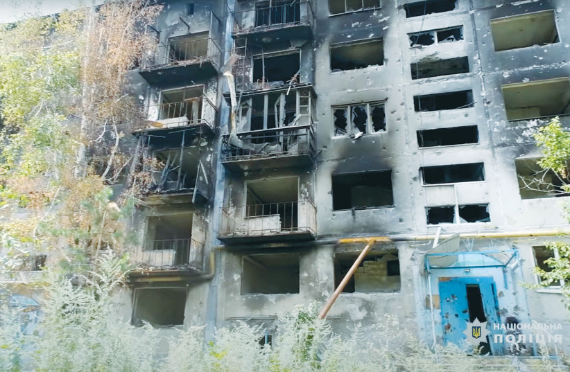  A BUILDING damaged in Donetsk region, Ukraine. (photo credit: Donetsk Region Police/Reuters)