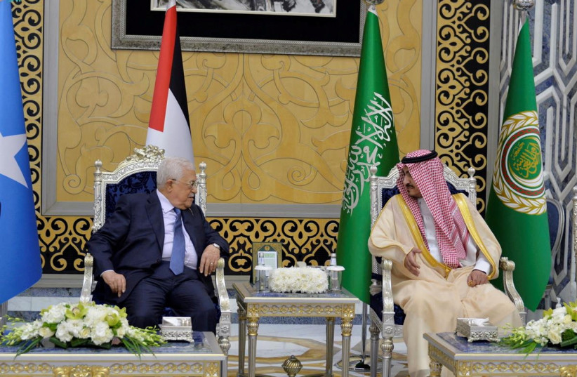  Palestinian President, Mahmoud Abbas, is received by Deputy Amir of Makkah, Prince Badr Bin Sultan, as he arrives to attend the Arab League Summit in Jeddah, Saudi Arabia, May 18, 2023 (photo credit: SAUDI PRESS AGENCY/HANDOUT VIA REUTERS)
