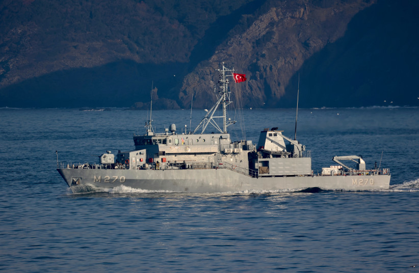  Turkish Navy's Aydin class mine hunting vessel TCG Akcay sails in the Bosphorus on its way to the Black Sea in Istanbul, Turkey March 26, 2022. (photo credit: REUTERS/YORUK ISIK)
