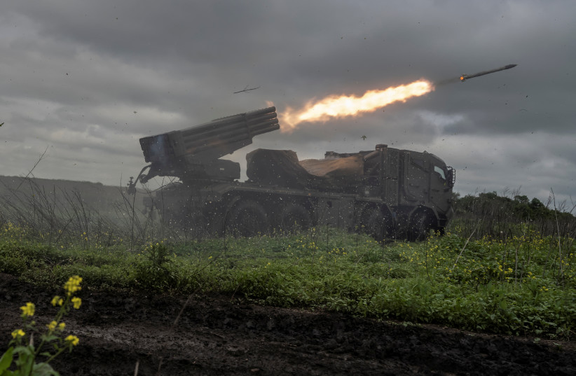  Ukrainian service members of the 55th Separate Artillery Brigade fire a Vampire multiple launch rocket system towards Russian troops, May 31 2023 (photo credit: REUTERS)
