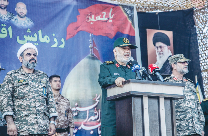  IRGC COMMANDER-in-Chief Major General Hossein Salami speaks during an exercise at Abu Musa Island, near the entrance to the Strait of Hormuz, earlier this month.  (photo credit: IRGC/West Asia News Agency/Reuters)