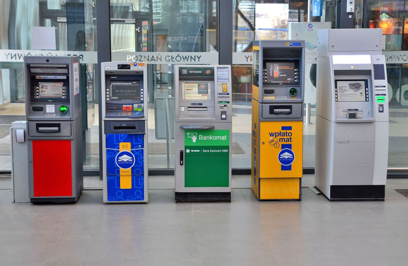  ATMs at the Poznań Główny railway station in Poznań, Poland. (photo credit: ADRIAN GRYCUK/WIKIMEDIA COMMONS)