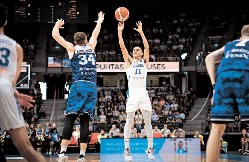 YAM MADAR (11) and Israel lost 67-65 to Estonia on Tuesday night, but clinched a spot in the semifinals in the Olympic Pre-Qualifying Tournament, which will continue this weekend. (photo credit: FIBA/COURTESY)
