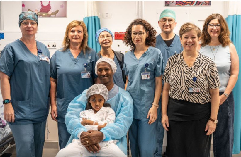  Galila Yohannes with her team of doctors at Tel Aviv Sourasky Medical Center. (photo credit: LIOR TZUR)