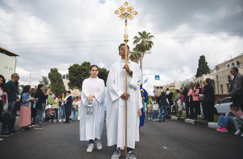  CHRISTIANS TAKE part in a Virgin Mary procession, in Haifa, April 30, 2023. Jewish monotheism was spread to Europe as Christianity, the writer says.  (photo credit: SHIR TOREM/FLASH90)